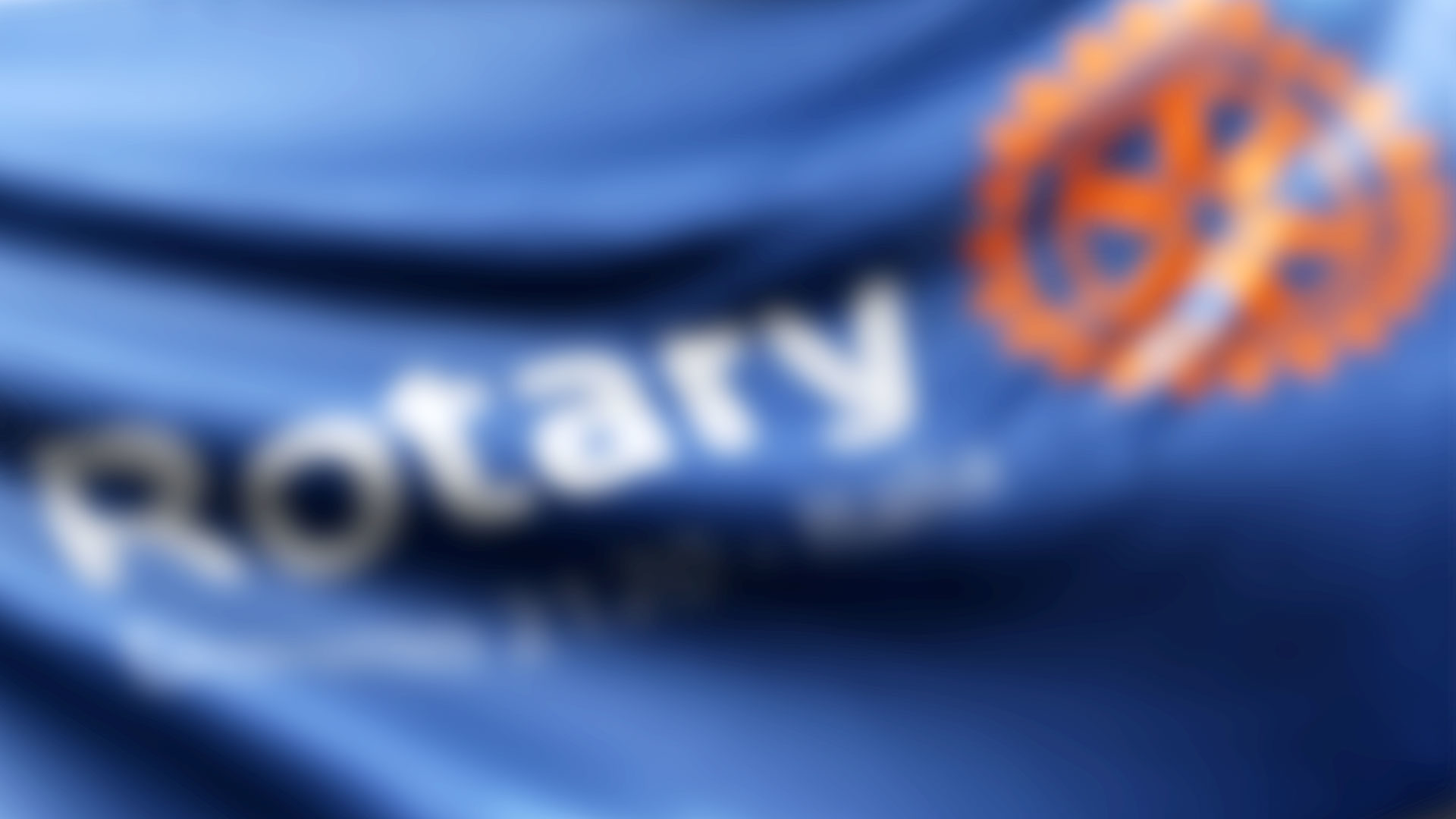 cropped-background-flag-rotary.jpg